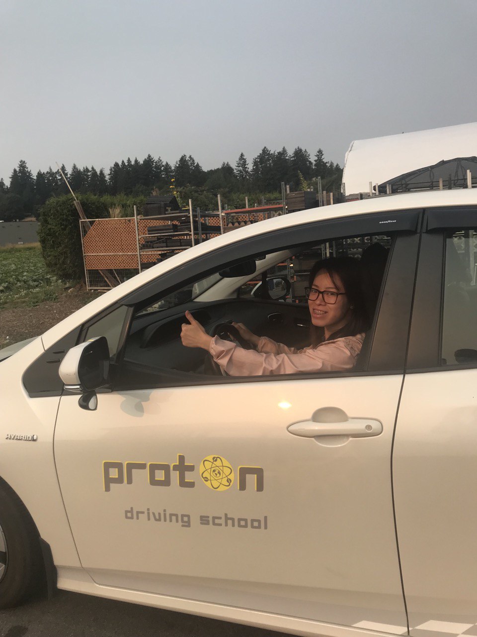 student inside car